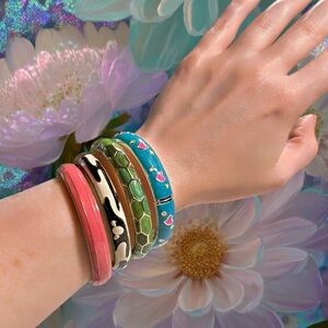 Vintage • 4 Mixed Pattern Stacking Bangles